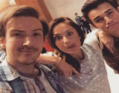 Minka Kelly with her two buddies in an event